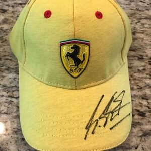 Yellow Ferrari hat with Schumacher signature